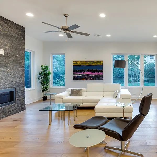 Contemporary spec home staging in Tampa featuring modern living room with open layout and clean design