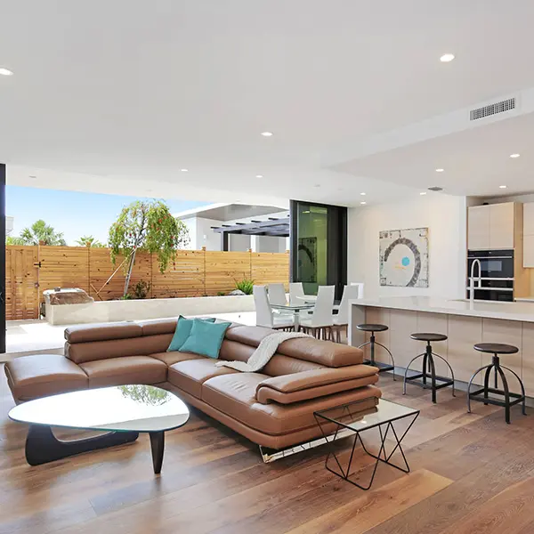 Luxury condo staging in Downtown Sarasota featuring modern open living space with indoor-outdoor design and contemporary furnishings