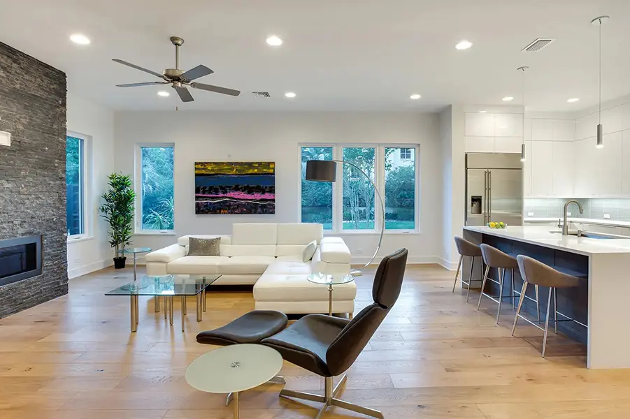 Contemporary spec home staging in Tampa featuring modern living room with open layout and clean design