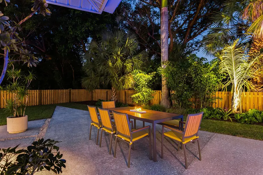 Contemporary home staging in Bird Key Sarasota featuring modern accent chair and minimalist interior design