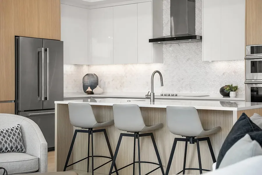 Contemporary condo staging in Downtown Sarasota featuring modern dining area with neutral tones and clean lines