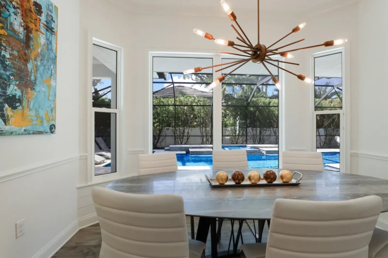 Dining room staging with pool view