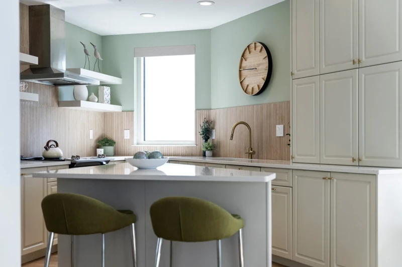 Kitchen staging with soft green modern design