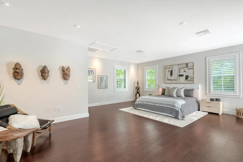 Spacious modern bedroom with eclectic decor