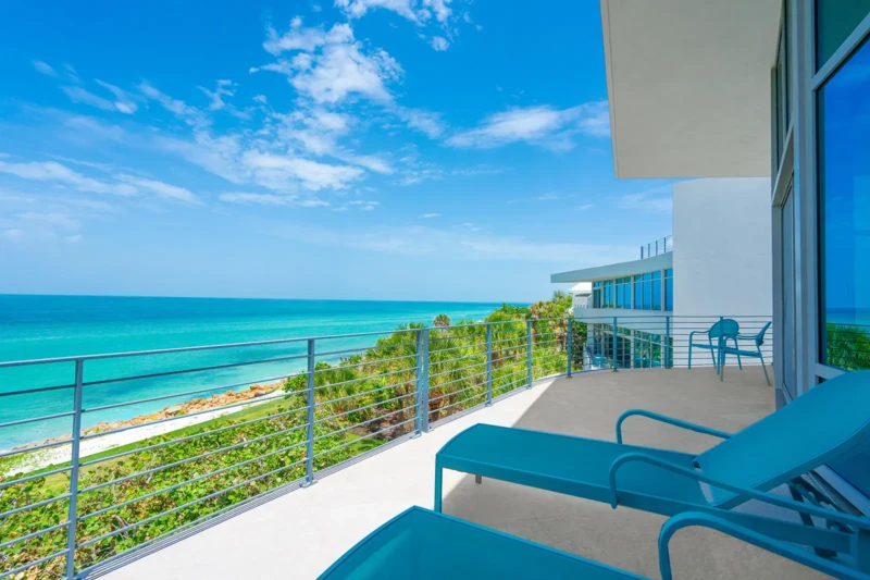 Expansive Gulf view balcony at contemporary waterfront home on Casey Key