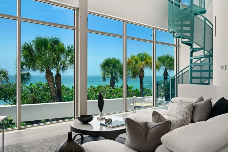 Waterfront living room staging with Gulf views on Casey Key Sarasota