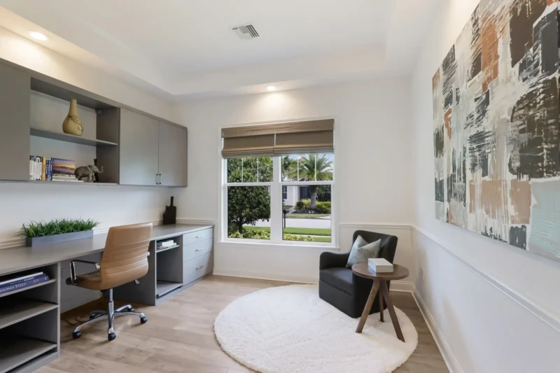 Modern home office staging with built-in desk in West of Trail Sarasota coastal contemporary residence