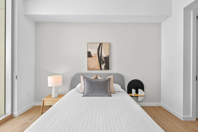 Contemporary bedroom home staging with neutral palette and minimalist decor