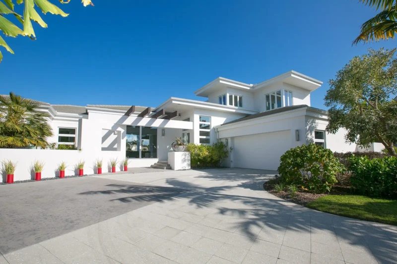 Contemporary waterfront home staging in Bay Isles South on Longboat Key with modern coastal architecture