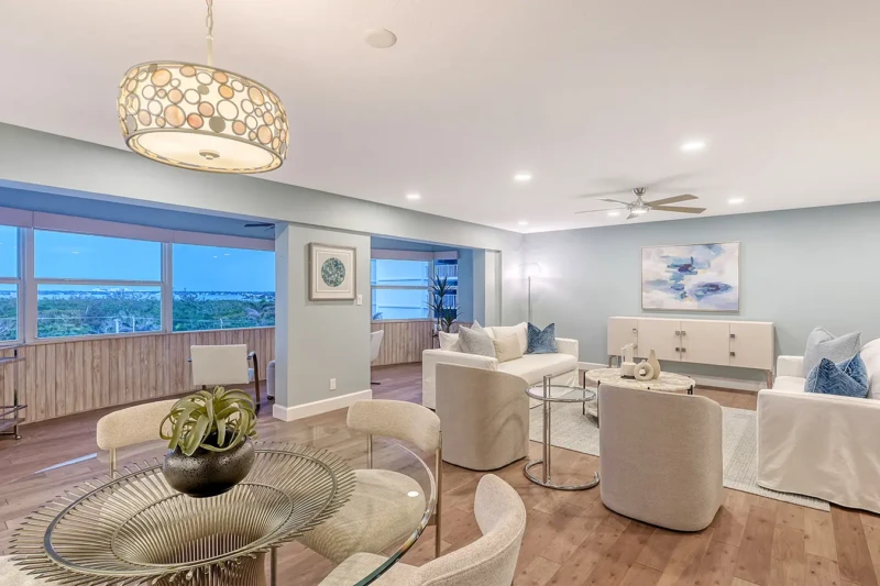 Coastal contemporary open living and dining room staging on Lido Key
