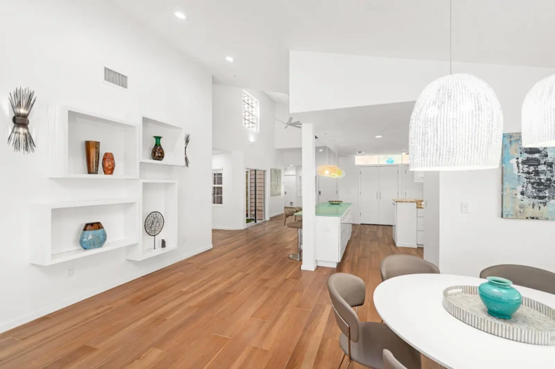 Coastal contemporary condo dining and kitchen staging in Bay Isles on Longboat Key