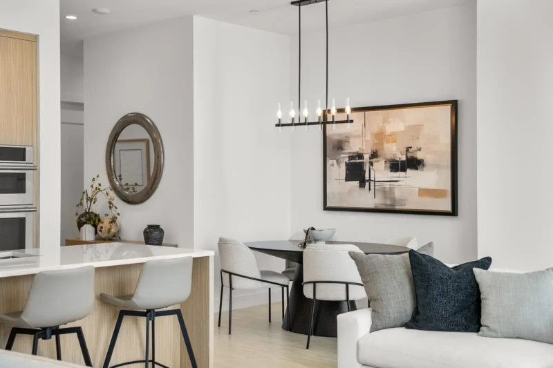 Luxury condo dining area and kitchen staging