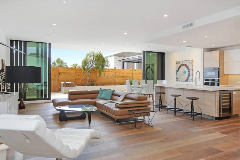 Luxury modern kitchen and living room staging with indoor-outdoor design in Sarasota contemporary condo