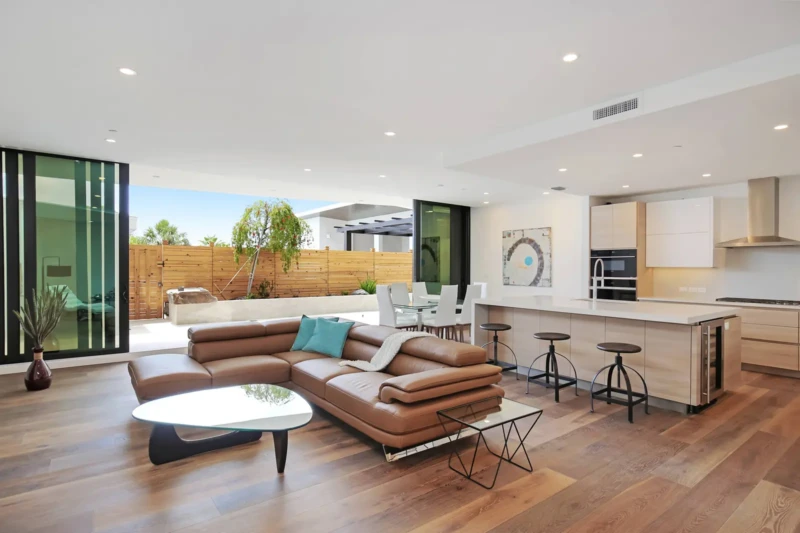 Luxury modern open-concept home staging with indoor-outdoor living and contemporary kitchen in Sarasota home