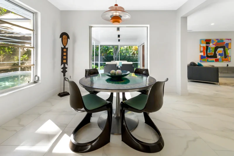 Mid-century modern dining room staging in a Siesta Key home