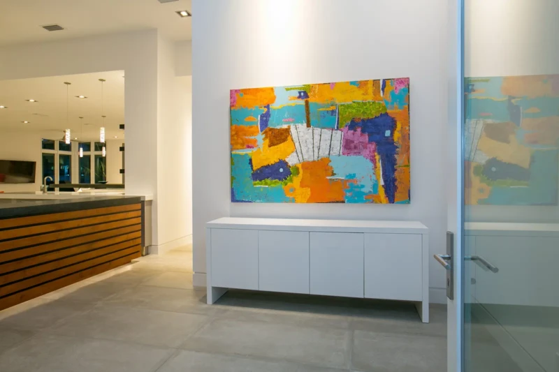 Modern entryway staging with contemporary artwork in Bay Isles South luxury home on Longboat Key