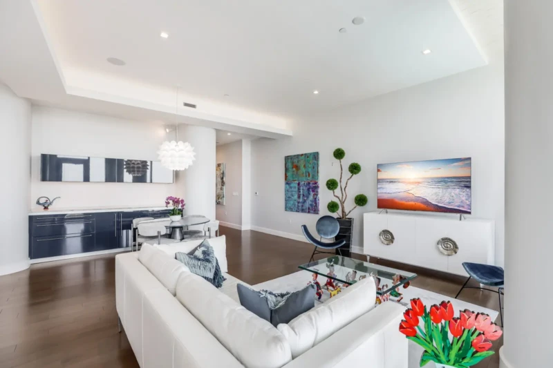 Modern luxury condo living area staging at The Jewel Sarasota with contemporary furnishings and open layout
