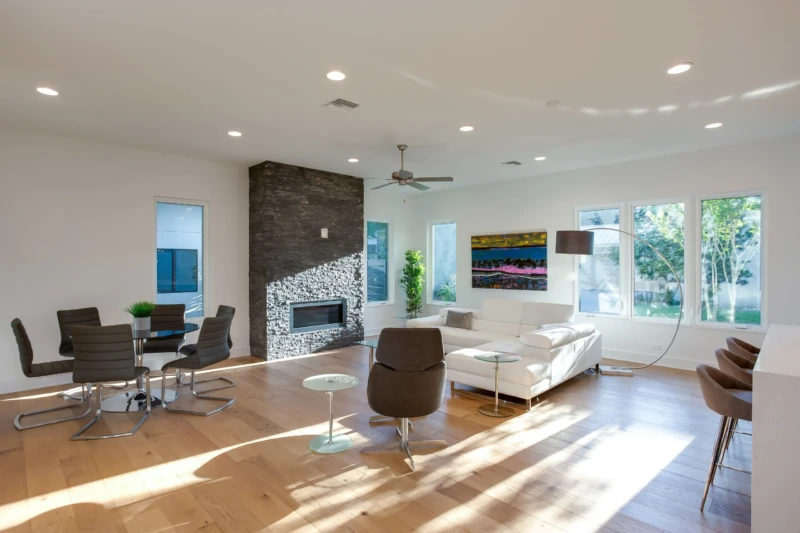 Modern luxury living room staging with contemporary fireplace and open-concept design
