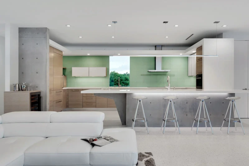Modern minimalist kitchen with concrete island and open-concept luxury interior on Longboat Key