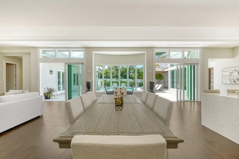 Open dining room home staging with contemporary kitchen and indoor-outdoor flow
