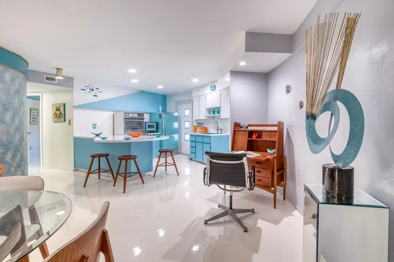 Mid-century modern home office and turquoise kitchen staging in Sarasota Round House