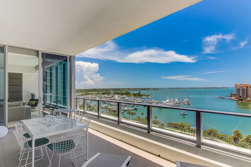 Luxury condo balcony with Sarasota Bay views at The VUE Sarasota Bay