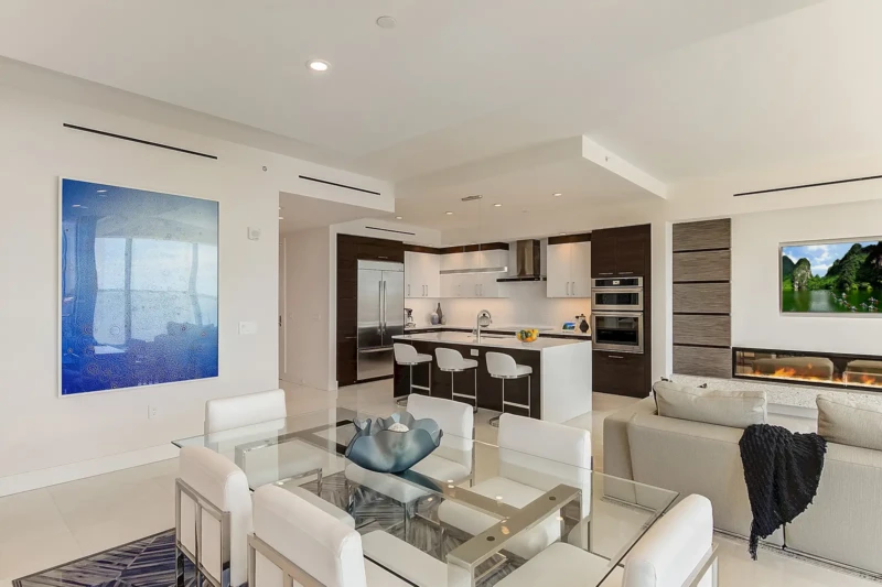 Luxury condo kitchen and dining room staging at The VUE Sarasota