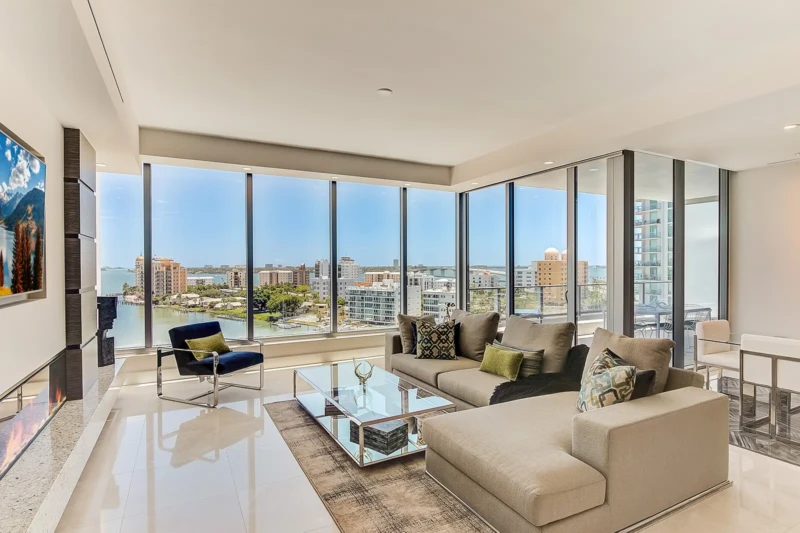 Luxury condo living room staging with Sarasota Bay views at The VUE