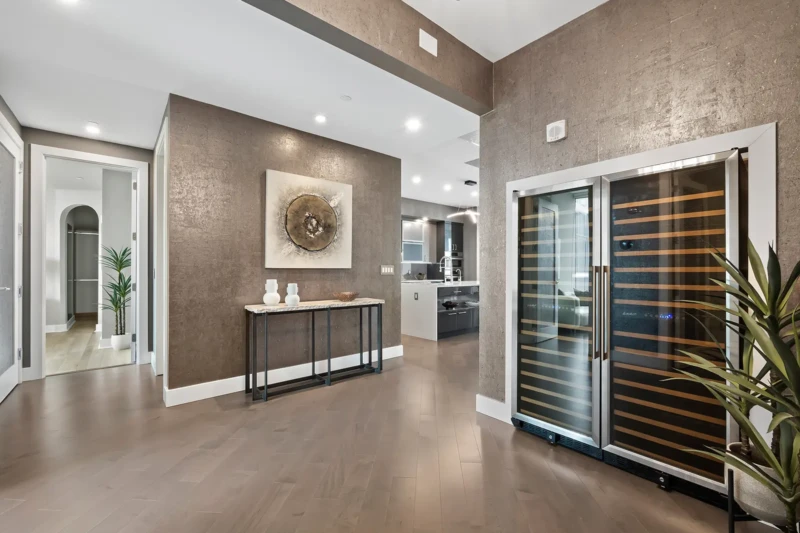 Luxury condo entryway and wine room staging at The VUE Sarasota