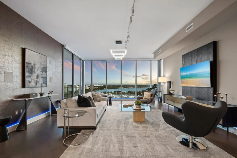 Luxury condo living room staging with sunset views at The VUE Sarasota