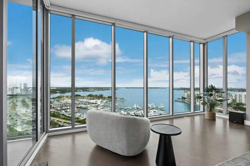 Panoramic Sarasota Bay views from a staged luxury condo at The VUE