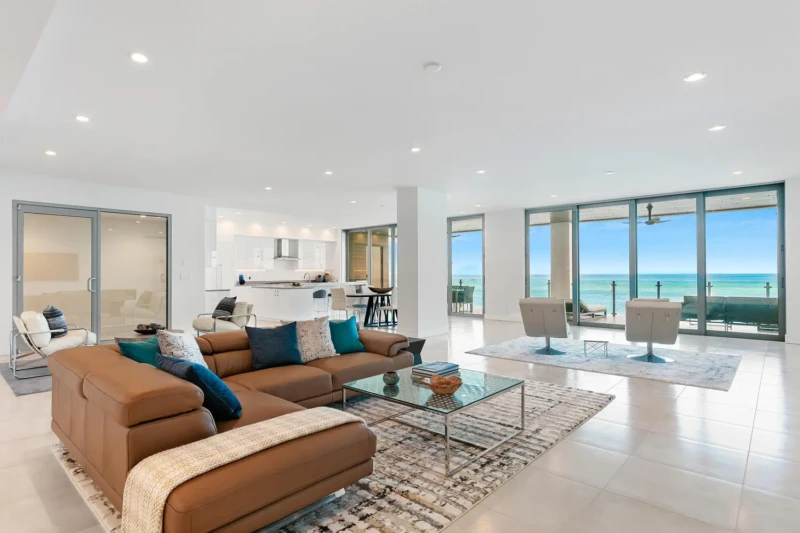 Waterfront condo staging on Siesta Key featuring Gulf views, open-concept luxury interiors, and contemporary coastal living design